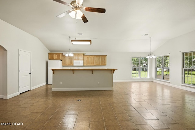 305 Dogwood Trails Loop, Carl Junction, MO 64834 - unfurnished living room featuring lofted ceiling, a chandelier, ceiling fan, tile patterned flooring, and arched walkways