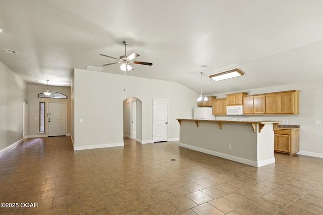 305 Dogwood Trails Loop, Carl Junction, MO 64834 - unfurnished living room with arched walkways, ceiling fan, and lofted ceiling