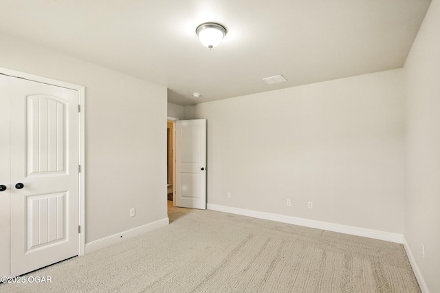 305 Dogwood Trails Loop, Carl Junction, MO 64834 - unfurnished bedroom featuring carpet and a closet