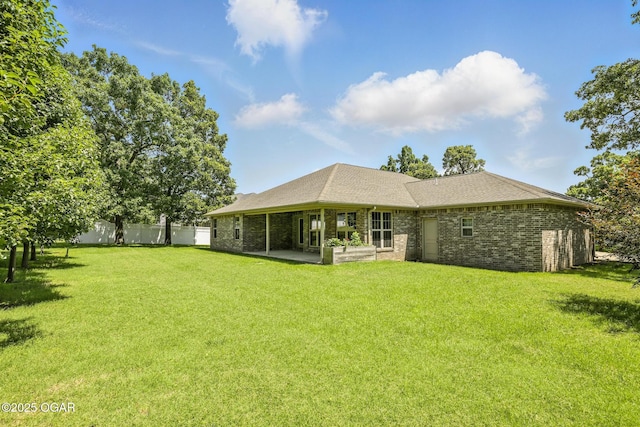 305 Dogwood Trails Loop, Carl Junction, MO 64834 - rear view of house with a patio and brick siding