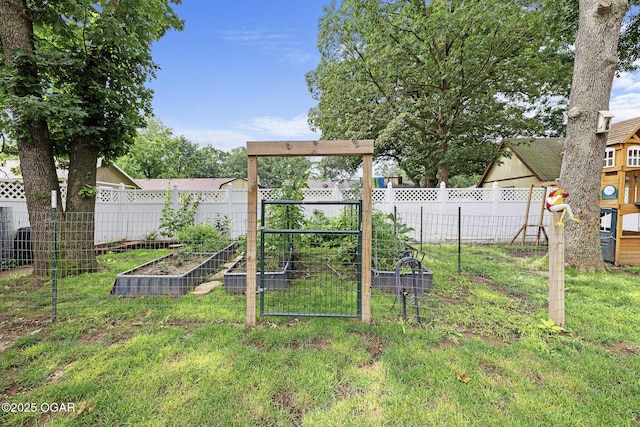 3502 Hackberry Ln, Joplin, MO 64801 - fenced backyard with a vegetable garden