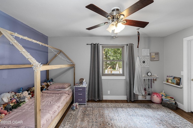 3502 Hackberry Ln, Joplin, MO 64801 - bedroom featuring wood finished floors and a ceiling fan