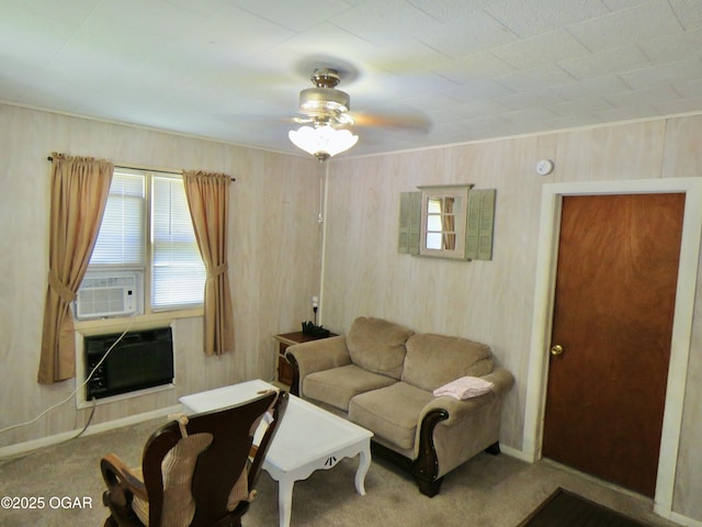 722 E Budlong St, Carthage, MO 64836 - carpeted living area with ceiling fan, cooling unit, a wall mounted AC, and wood walls