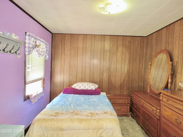 722 E Budlong St, Carthage, MO 64836 - bedroom with wood walls and light carpet