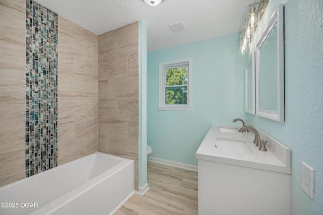 303 Water St, Exeter, MO 65647 - full bath with wood finished floors, double vanity, and tub / shower combination