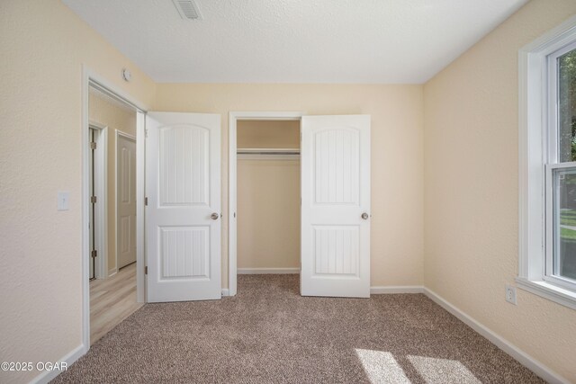 303 Water St, Exeter, MO 65647 - unfurnished bedroom with carpet flooring and a closet