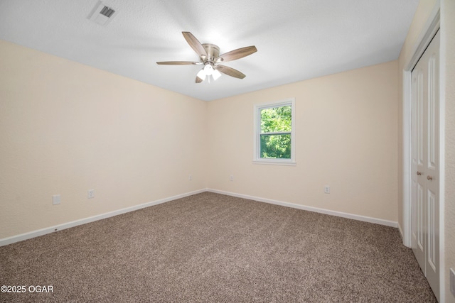 303 Water St, Exeter, MO 65647 - unfurnished bedroom featuring a closet, carpet, and a ceiling fan