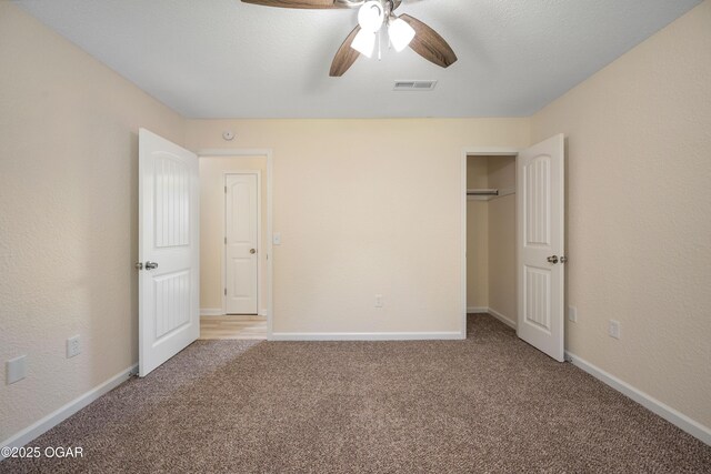 303 Water St, Exeter, MO 65647 - unfurnished bedroom with carpet flooring, a closet, and ceiling fan