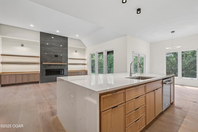 5077 Eagle Valley Dr, Joplin, MO 64804 - kitchen with light wood-style floors, plenty of natural light, light countertops, recessed lighting, and vaulted ceiling