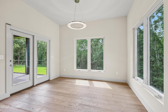 5077 Eagle Valley Dr, Joplin, MO 64804 - unfurnished dining area featuring healthy amount of natural light and light wood finished floors