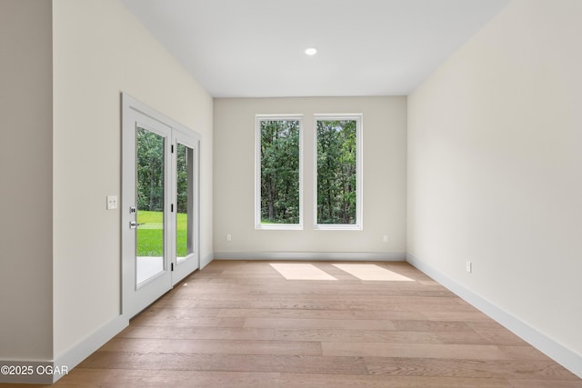 5077 Eagle Valley Dr, Joplin, MO 64804 - spare room with light wood-style flooring and recessed lighting