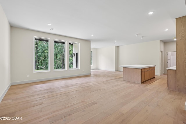 5077 Eagle Valley Dr, Joplin, MO 64804 - unfurnished room with light wood-type flooring and recessed lighting