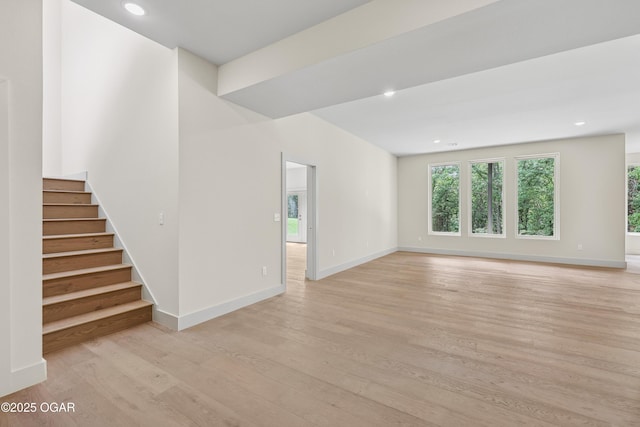 5077 Eagle Valley Dr, Joplin, MO 64804 - spare room with light wood-type flooring, stairs, and recessed lighting