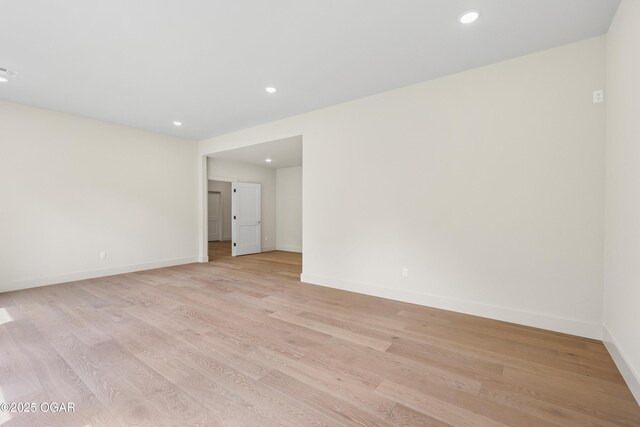 5077 Eagle Valley Dr, Joplin, MO 64804 - empty room featuring light wood-type flooring and recessed lighting