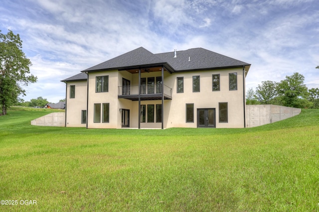 5077 Eagle Valley Dr, Joplin, MO 64804 - rear view of house with a balcony, ceiling fan, a lawn, and stucco siding