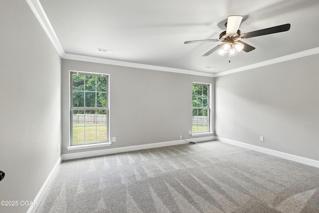 2102 S Greystone Sq, Oronogo, MO 64855 - spare room with ornamental molding, carpet floors, plenty of natural light, and ceiling fan