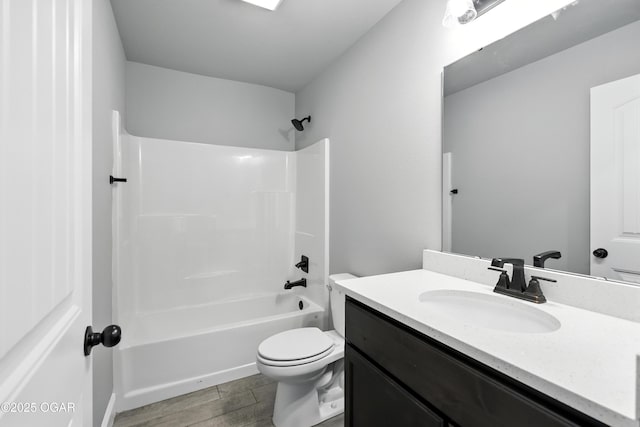 2102 S Greystone Sq, Oronogo, MO 64855 - full bath featuring vanity, shower / washtub combination, and wood finished floors