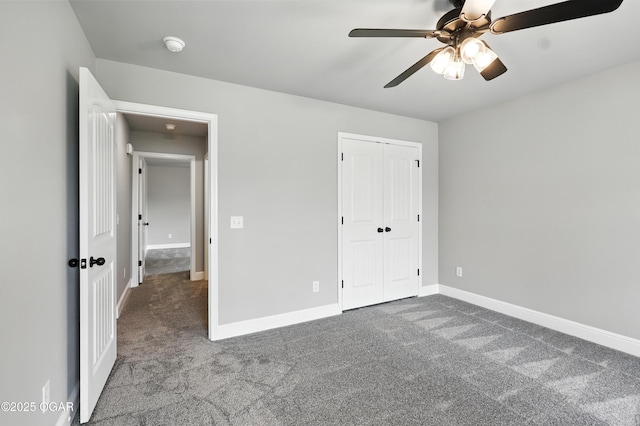 2102 S Greystone Sq, Oronogo, MO 64855 - unfurnished bedroom featuring carpet, a closet, and a ceiling fan