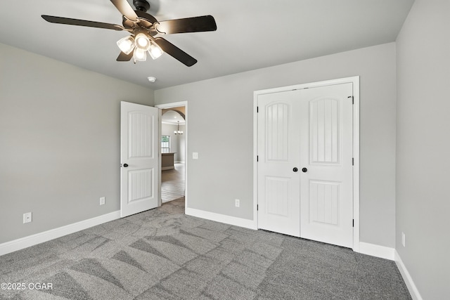 2102 S Greystone Sq, Oronogo, MO 64855 - unfurnished bedroom featuring carpet floors, a closet, and ceiling fan