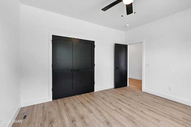 4308 Par Ln, Joplin, MO 64804 - unfurnished bedroom featuring light wood-style floors, ceiling fan, and a closet
