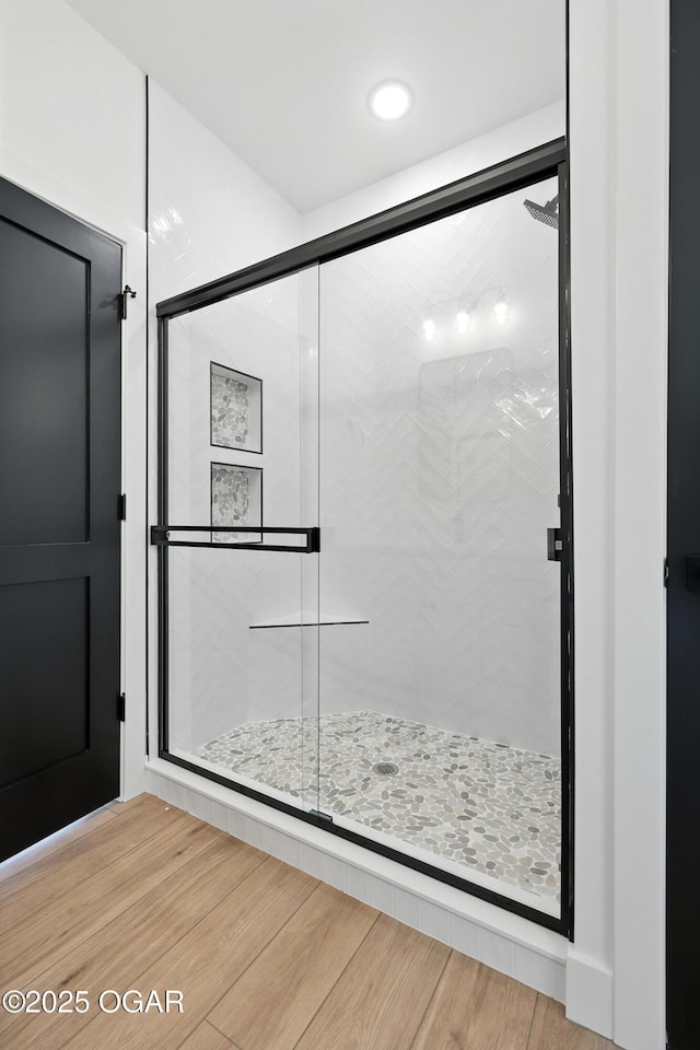 4308 Par Ln, Joplin, MO 64804 - full bathroom featuring a stall shower and wood finished floors
