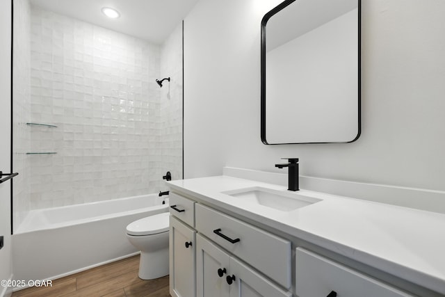 4308 Par Ln, Joplin, MO 64804 - full bath with vanity, wood finished floors, shower / bath combination, and recessed lighting