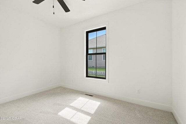 4402 Par Ln, Joplin, MO 64804 - carpeted spare room with a ceiling fan and baseboards