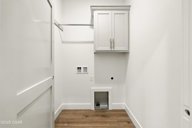 4402 Par Ln, Joplin, MO 64804 - washroom with electric dryer hookup, washer hookup, wood finished floors, and cabinet space