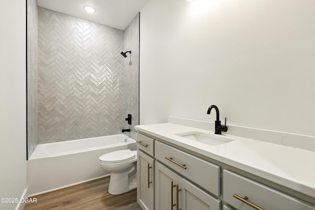 4402 Par Ln, Joplin, MO 64804 - bathroom featuring vanity, wood finished floors, and shower / tub combination