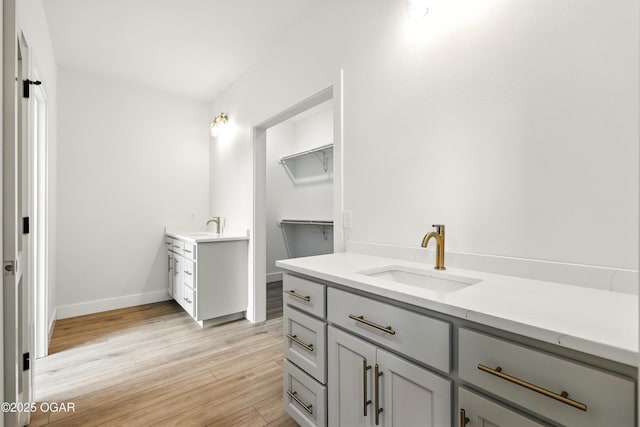 4402 Par Ln, Joplin, MO 64804 - bathroom with vanity and wood finished floors