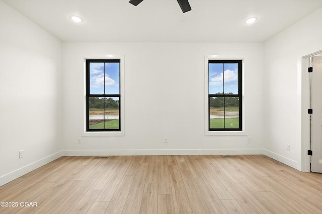 4402 Par Ln, Joplin, MO 64804 - unfurnished room featuring light wood finished floors, ceiling fan, and recessed lighting