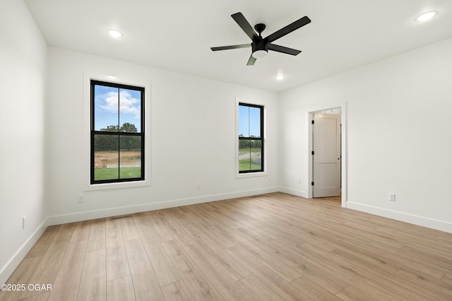 4402 Par Ln, Joplin, MO 64804 - empty room with healthy amount of natural light, light wood-type flooring, ceiling fan, and recessed lighting