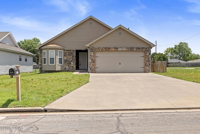 2329 S Willard Ave, Joplin, MO 64804 - view of front of home with an attached garage and driveway
