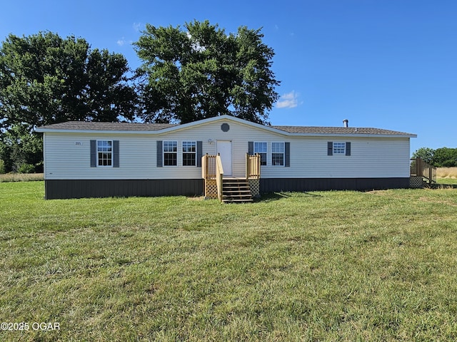 205 College St, Stark City, MO 64866 - manufactured / mobile home with a front yard