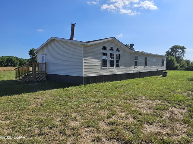 205 College St, Stark City, MO 64866 - view of property exterior with a yard