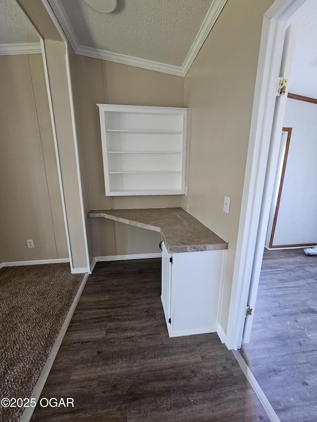 205 College St, Stark City, MO 64866 - unfurnished office with a textured ceiling, dark wood finished floors, and ornamental molding
