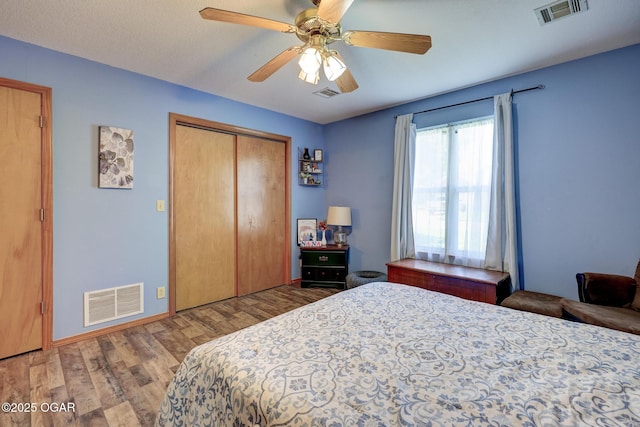 1717 Logan Drive `, Webb City, MO 64870 - bedroom featuring wood finished floors, a closet, and a ceiling fan