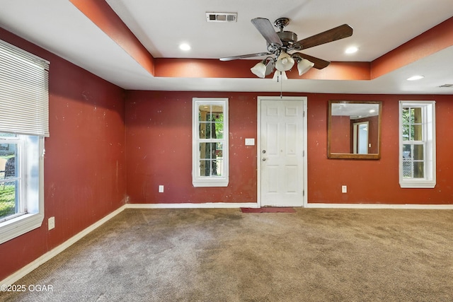 624 N Devon St, Webb City, MO 64870 - foyer featuring carpet, healthy amount of natural light, ceiling fan, a raised ceiling, and recessed lighting