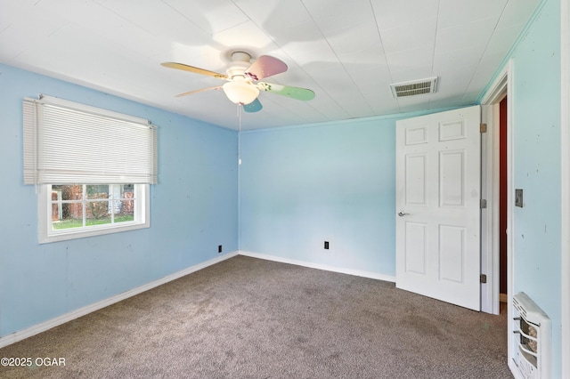 624 N Devon St, Webb City, MO 64870 - spare room featuring carpet flooring, a ceiling fan, and heating unit