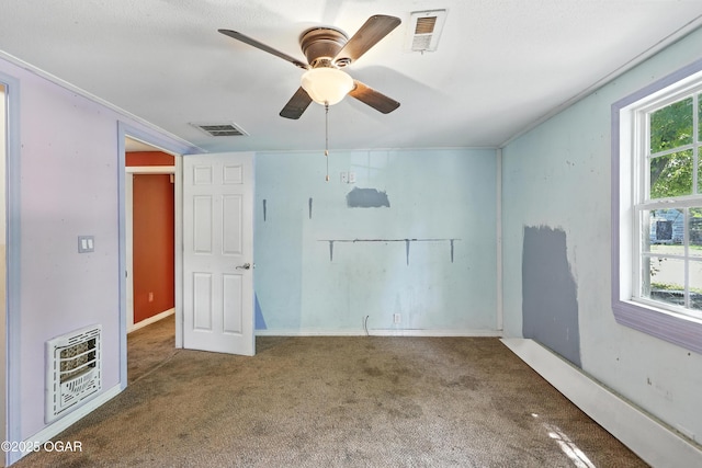 624 N Devon St, Webb City, MO 64870 - carpeted empty room with ceiling fan and heating unit