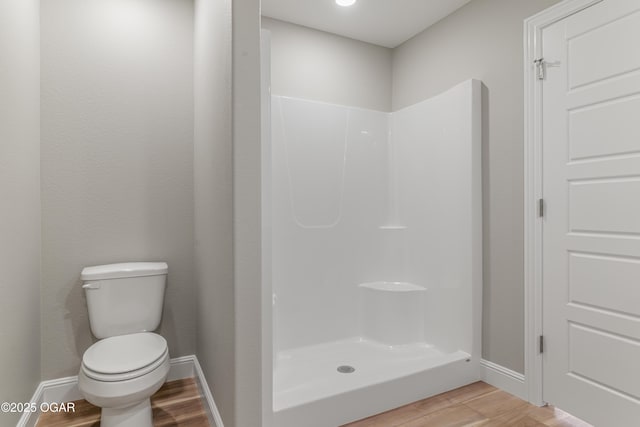1220 Sheila Ann Dr, Carthage, MO 64836 - full bath featuring wood finished floors and a shower