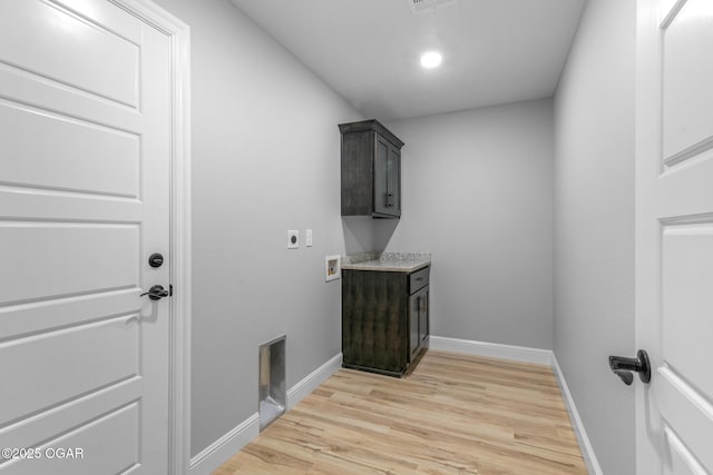 1224 Sheila Ann Dr, Carthage, MO 64836 - laundry room featuring hookup for an electric dryer, light wood-type flooring, cabinet space, hookup for a washing machine, and recessed lighting