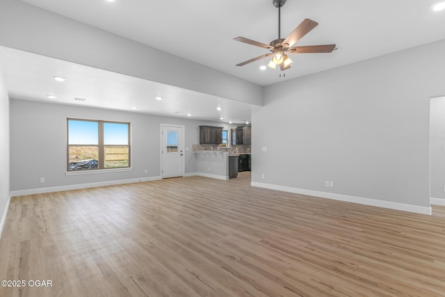 1224 Sheila Ann Dr, Carthage, MO 64836 - unfurnished living room with light wood-style flooring, recessed lighting, and ceiling fan