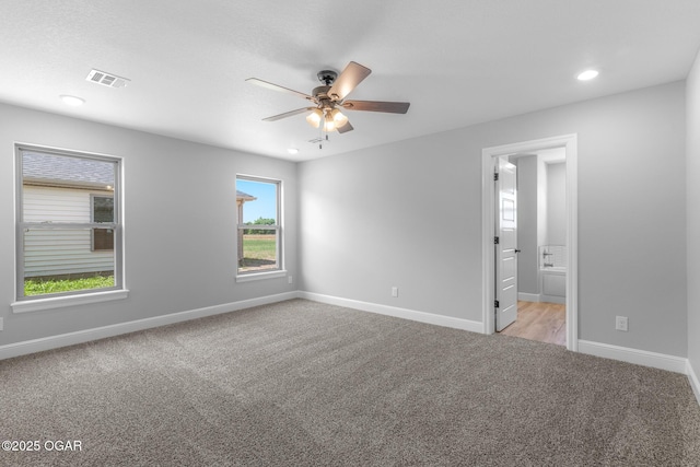1224 Sheila Ann Dr, Carthage, MO 64836 - spare room featuring light colored carpet, a ceiling fan, and recessed lighting