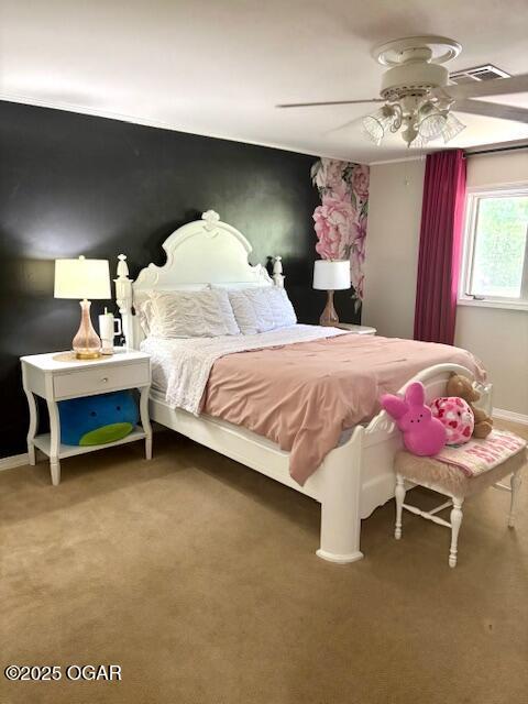 1606 Fairview Ave, Baxter Springs, KS 66713 - bedroom with a ceiling fan and carpet flooring