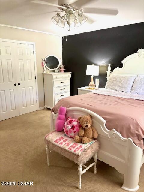 1606 Fairview Ave, Baxter Springs, KS 66713 - bedroom featuring light carpet and a ceiling fan