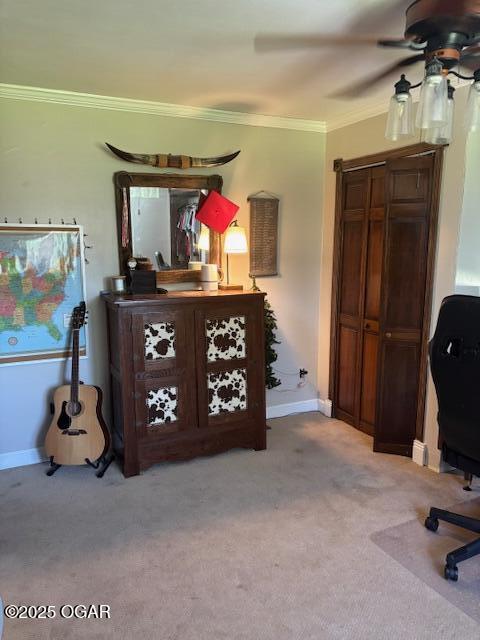 1606 Fairview Ave, Baxter Springs, KS 66713 - bedroom with light carpet, crown molding, a ceiling fan, and a closet