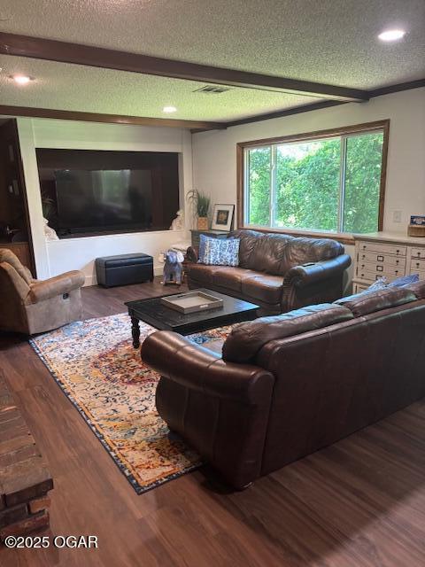 1606 Fairview Ave, Baxter Springs, KS 66713 - living room with a textured ceiling, wood finished floors, and recessed lighting