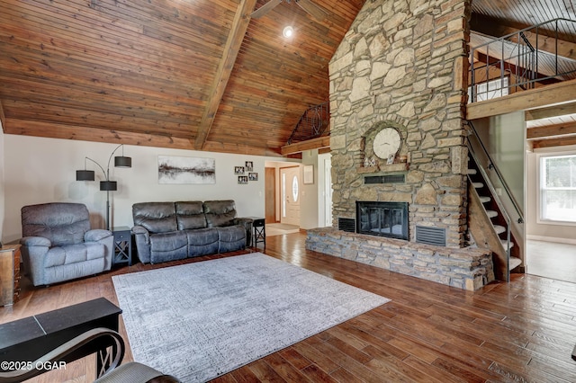 204 Split Rail Dr, Joplin, MO 64801 - living room with high vaulted ceiling, stairway, a wooden ceiling with exposed beams, hardwood / wood-style flooring, and a fireplace