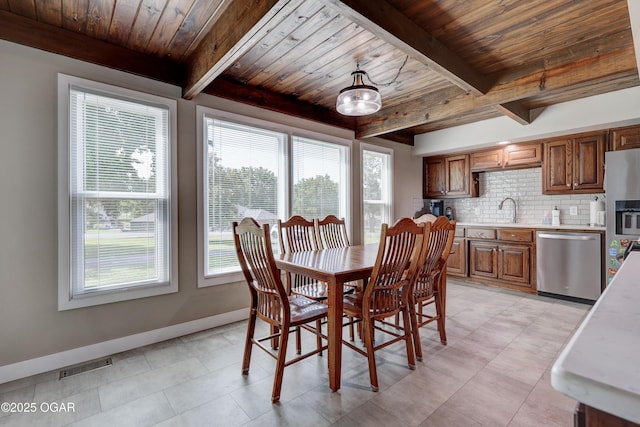 204 Split Rail Dr, Joplin, MO 64801 - dining space with a wood ceiling with exposed beams and healthy amount of natural light